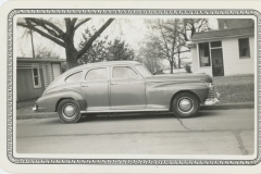 Oldsmobile in front of Rodkey House